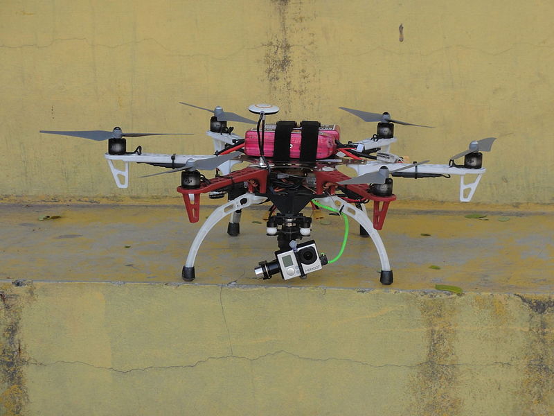 A large Drone sitting on concrete